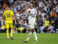 Jude Bellingham of Real Madrid CF cheers the fans at the end of the La Liga EA Sports 2024/25 football match between Real Madrid CF and Vill...