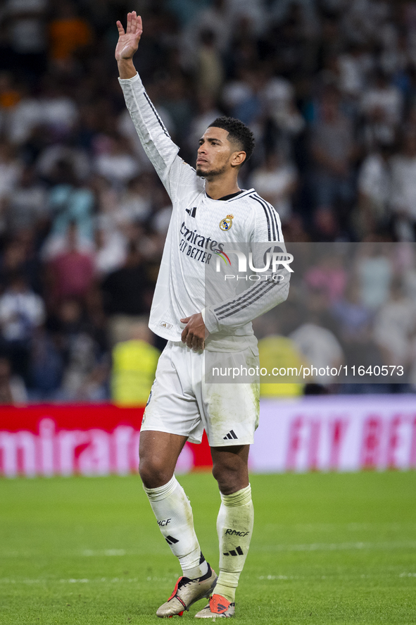 Jude Bellingham of Real Madrid CF cheers the fans at the end of the La Liga EA Sports 2024/25 football match between Real Madrid CF and Vill...