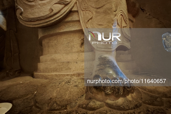 Lifelike statues are seen in the Xiangtang Mountain Grottoes in Handan, China, on October 5, 2024. 