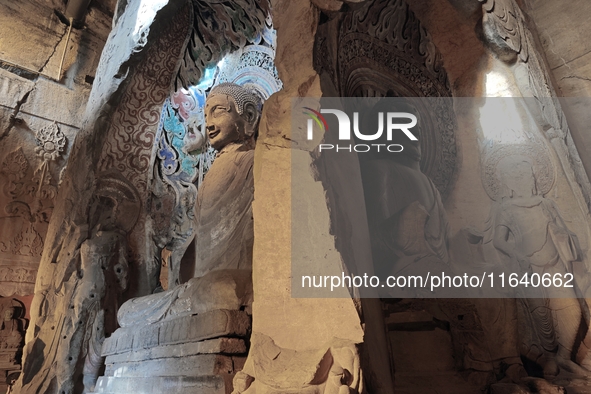 Lifelike statues are seen in the Xiangtang Mountain Grottoes in Handan, China, on October 5, 2024. 