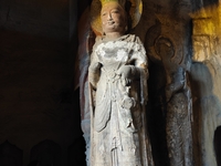 Tourists visit the Xiangtang Mountain Grottoes in Handan, China, on October 5, 2024. (