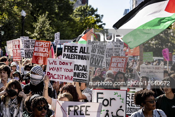 On October 4, 2024, in Washington, DC, United States, outside the White House in Lafayette Square, 100 pro-Palestine protesters gather for t...