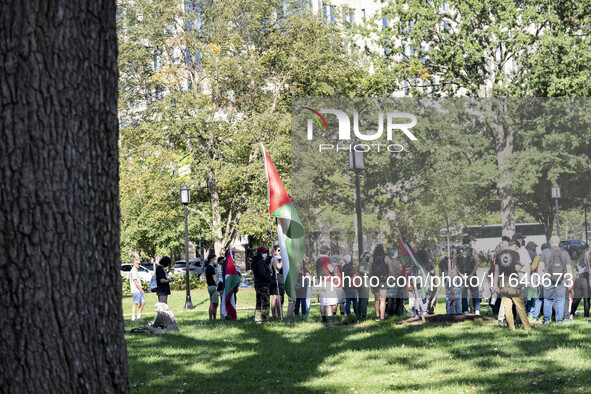 On October 4, 2024, in Washington, DC, United States, outside the White House in Lafayette Square, 100 pro-Palestine protesters gather for t...