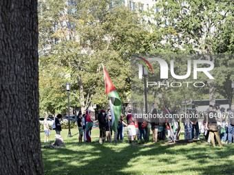 On October 4, 2024, in Washington, DC, United States, outside the White House in Lafayette Square, 100 pro-Palestine protesters gather for t...