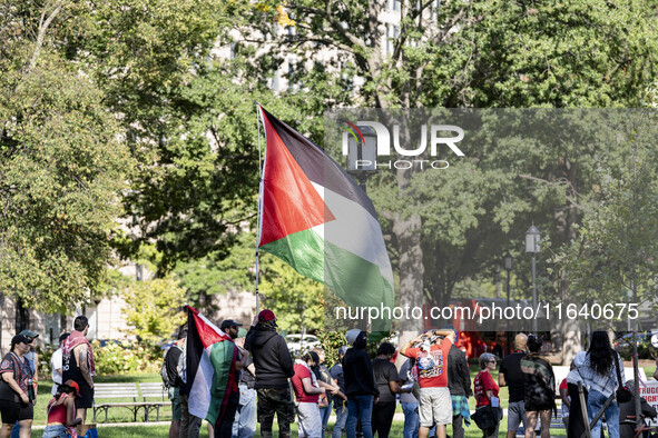 On October 4, 2024, in Washington, DC, United States, outside the White House in Lafayette Square, 100 pro-Palestine protesters gather for t...