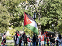 On October 4, 2024, in Washington, DC, United States, outside the White House in Lafayette Square, 100 pro-Palestine protesters gather for t...