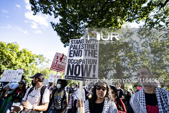 On October 4, 2024, in Washington, DC, United States, outside the White House in Lafayette Square, 100 pro-Palestine protesters gather for t...