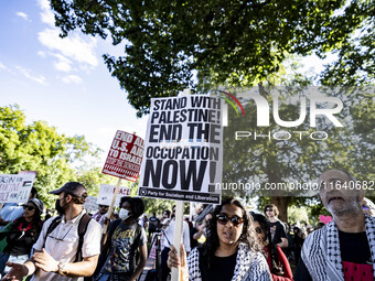 On October 4, 2024, in Washington, DC, United States, outside the White House in Lafayette Square, 100 pro-Palestine protesters gather for t...