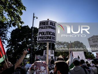 On October 4, 2024, in Washington, DC, United States, outside the White House in Lafayette Square, 100 pro-Palestine protesters gather for t...