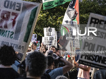 On October 4, 2024, in Washington, DC, United States, outside the White House in Lafayette Square, 100 pro-Palestine protesters gather for t...