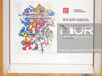 Transformers x UNIQLO co-branded custom T-shirts are displayed at the Uniqlo flagship store in Shanghai, China, on October 4, 2024. This yea...