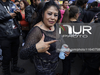 A woman poses during the 44th Anniversary of the Tianguis Cultural del Chopo in Mexico City, Mexico, on October 5, 2024. This place originat...