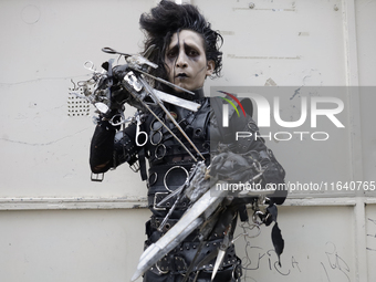 A young man dresses as the Scissorhands Man during a concert on the occasion of the 44th anniversary of the Tianguis Cultural del Chopo in M...