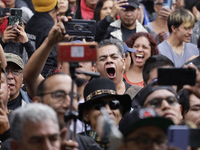 Young people dance during a concert to mark the 44th anniversary of the Tianguis Cultural del Chopo in Mexico City, Mexico, on October 5, 20...