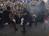 Members of the band Transmetal offer a concert on the occasion of the 44th anniversary of the Tianguis Cultural del Chopo in Mexico City, Me...