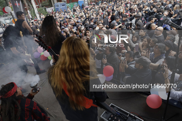 Members of the band Transmetal offer a concert on the occasion of the 44th anniversary of the Tianguis Cultural del Chopo in Mexico City, Me...