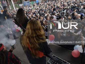 Members of the band Transmetal offer a concert on the occasion of the 44th anniversary of the Tianguis Cultural del Chopo in Mexico City, Me...