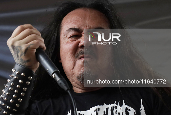 The vocalist of the band Transmetal offers a concert on the occasion of the 44th anniversary of the Tianguis Cultural del Chopo in Mexico Ci...