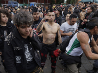 Young people dance during a concert to mark the 44th anniversary of the Tianguis Cultural del Chopo in Mexico City, Mexico, on October 5, 20...