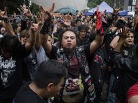 Young people dance during a concert to mark the 44th anniversary of the Tianguis Cultural del Chopo in Mexico City, Mexico, on October 5, 20...