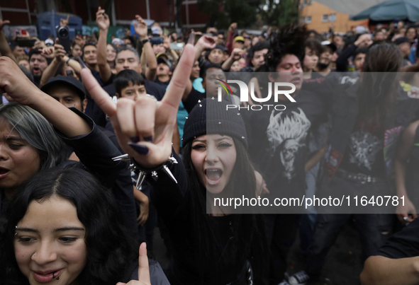 Young people dance during a concert to mark the 44th anniversary of the Tianguis Cultural del Chopo in Mexico City, Mexico, on October 5, 20...