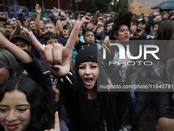 Young people dance during a concert to mark the 44th anniversary of the Tianguis Cultural del Chopo in Mexico City, Mexico, on October 5, 20...