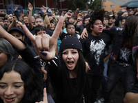 Young people dance during a concert to mark the 44th anniversary of the Tianguis Cultural del Chopo in Mexico City, Mexico, on October 5, 20...