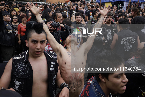 Young people dance during a concert to mark the 44th anniversary of the Tianguis Cultural del Chopo in Mexico City, Mexico, on October 5, 20...