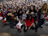 Members of the band Transmetal take a photo at the end of the concert on the occasion of the 44th anniversary of the Tianguis Cultural del C...