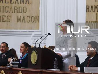 Clara Brugada Molina speaks during the swearing-in ceremony as Mexico City Head of Government at the Congress of Mexico City on October 5, 2...