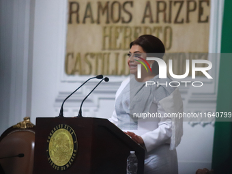 Clara Brugada Molina speaks during the swearing-in ceremony as Mexico City Head of Government at the Congress of Mexico City on October 5, 2...