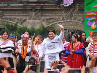 Incoming Mexico City Chief of Government Clara Brugada Molina receives the baton of command from representatives of indigenous peoples durin...