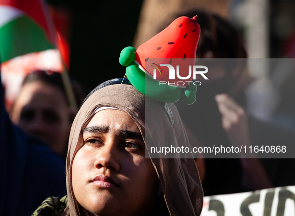 People demonstrate for ceasefires in Palestine and Lebanon at the White House in Washington, DC, on October 5, 2024. The protest is one of m...