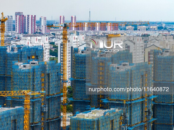 A real estate project is under construction in Huai'an District, Huai'an City, Jiangsu Province, China, on October 5, 2024. 