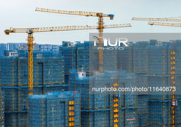 A real estate project is under construction in Huai'an District, Huai'an City, Jiangsu Province, China, on October 5, 2024. 