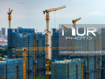 A real estate project is under construction in Huai'an District, Huai'an City, Jiangsu Province, China, on October 5, 2024. (