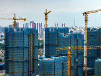 A real estate project is under construction in Huai'an District, Huai'an City, Jiangsu Province, China, on October 5, 2024. (