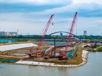 Workers work at the construction site of the Huaian Junction project of the second phase of the Huaihe River Waterway into the sea in Huai'a...