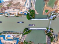 Workers work at the construction site of the Huaian Junction project of the second phase of the Huaihe River Waterway into the sea in Huai'a...