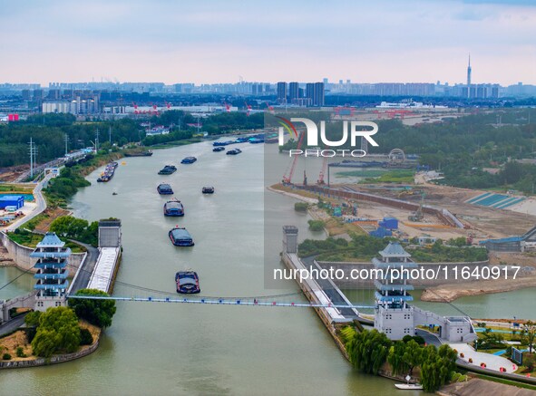 Workers work at the construction site of the Huaian Junction project of the second phase of the Huaihe River Waterway into the sea in Huai'a...