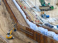 Workers work at the construction site of the Huaian Junction project of the second phase of the Huaihe River Waterway into the sea in Huai'a...