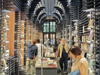 Visitors visit Zhongshuge Bookstore, the first bookstore to open in Tianjin, China, on September 30, 2024. (