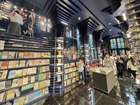 Visitors visit Zhongshuge Bookstore, the first bookstore to open in Tianjin, China, on September 30, 2024. (