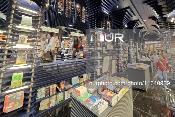 Visitors visit Zhongshuge Bookstore, the first bookstore to open in Tianjin, China, on September 30, 2024. 