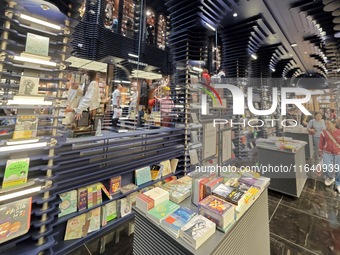 Visitors visit Zhongshuge Bookstore, the first bookstore to open in Tianjin, China, on September 30, 2024. (