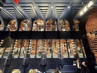 Visitors visit Zhongshuge Bookstore, the first bookstore to open in Tianjin, China, on September 30, 2024. (