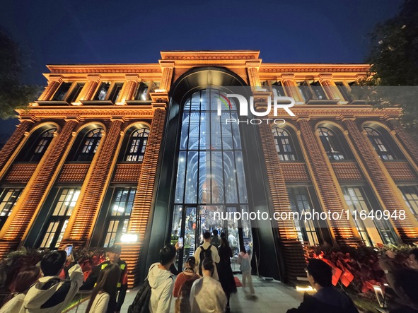 Visitors visit Zhongshuge Bookstore, the first bookstore to open in Tianjin, China, on September 30, 2024. 