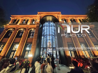 Visitors visit Zhongshuge Bookstore, the first bookstore to open in Tianjin, China, on September 30, 2024. (