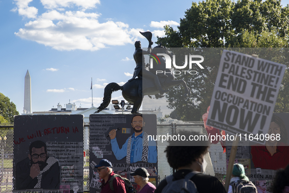 Hundreds gather during a pro-Palestinian rally as part of an international day of action near the White House in Washington DC, USA, on Octo...