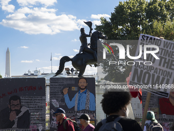 Hundreds gather during a pro-Palestinian rally as part of an international day of action near the White House in Washington DC, USA, on Octo...